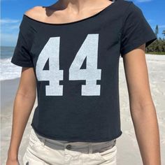 brandy melville robyn 44 black off shoulder top  brand new with tags! #brandy #melvile #top #black #offshoulder Arden Hoodie, Brandy Melville Tank Top, Brandy Melville Tank, Long Sleeve Wrap Top, Plaid Crop Top, Heart Tee, Grey Tank Top, Gray Tank, Brandy Melville Tops