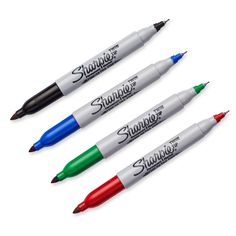 three markers with different colors on them