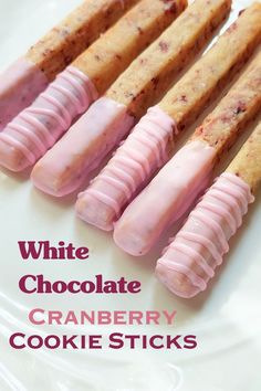 white chocolate cranberry cookie sticks on a plate with the words, white chocolate cranberry cookies