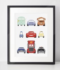 an art print with cars in different colors and sizes on the wall next to a black framed frame