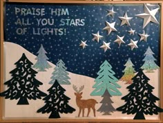 a christmas card with trees and stars in the background that says praise him all you stars of lights