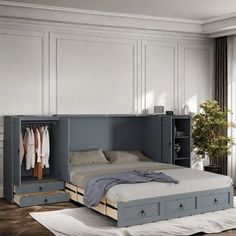 a bedroom with a bed, dresser and closets in it's center area