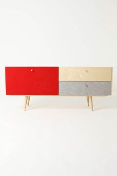 the sideboard is made out of wood and has two different colors