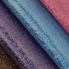 several different colors of sequinized fabric