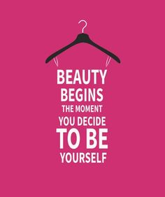 a hanger with the words, beauty begins the moment you decide to be yourself