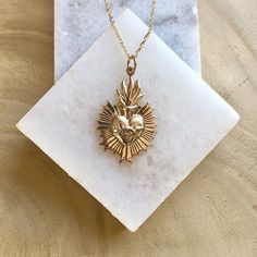 Radiant, Sacred Heart pendant in yellow bronze. Gorgeous Catholic and religious jewelry from Telos Art Shop. Sacred Heart Ring, Sacred Heart Jewelry, Catholic Fashion, Sacred Heart Necklace, Sacred Jewelry, Catholic Necklace, Sacred Heart Of Jesus, Heart Pendants, Catholic Jewelry