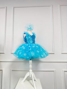 This Elsa Inspired Costume is our own design, and made of high quality satin, luxury sequin  fabric and tulles also there is an under pant under the dress.  The waist of the dress is rubber so that it can be adjusted according to the waist. The straps of the dress can be tied from the back, so you can adjust the dress according to her weight. With this Frozen Toddler Costume your princess will look stuning.. Tis Elsa Tutu Dress is efficient with its refined look.You can be sure that  your princess and friends will  fall in love with this Girl Birthday Costume.. We made this Elsa Birthday Outfit for your princess to look glamorous.. This Frozen Tutu dress is fabulous, gorgeous and perfect for your birthday parties, themed parties, pageants, cake smash photo shootings, cosplay parties and Ha Elsa Frozen Toddler Costume, Frozen Toddler Costume, Frozen Tutu Dress, Elsa Tutu, Frozen Tutu, Birthday Romper, Elsa Birthday, Halloween Tutu, Frozen Costume