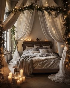 a bedroom decorated for christmas with candles on the bed and lights hanging from the ceiling