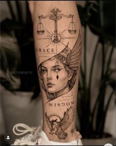 a woman's leg with tattoos on it and the words grace, wisdom, and libra