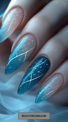 Cool off in style with these 15 frosty blue winter nail designs for 2025! Featuring icy hues, ombre finishes, and shimmering accents, these nails are perfect for embracing the chill of the season. Save this pin for stunning winter blue nail inspiration! #BlueNails #WinterChic #IcyNails Elsa Inspired Nails, Northern Light Nails, Icy Winter Nails, Frosty Blue Nails, Icy Blue Nails Winter, Icy Nails Winter, Blue Winter Nail Ideas, Blue White And Silver Nails, Blue Nail Inspiration