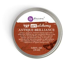 an open tin of art alchemy antique brillance