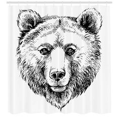 a black and white drawing of a bear's head