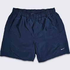 Nike Dark Navy Blue Swimming Shorts  Elastic Waist , Adjustable Has Pockets  Swoosh Logo Mesh Lining Above the Knee Cut In Decent Vintage Condition No Stains Small Hole on the Back - Shown in Pictures Size Men's Large PLEASE CHECK THE MEASUREMENTS Measurements: Waist: 32 in Total Length: 17.5 in Inseam: 6.5 in FREE AND FAST SHIPPING IN THE USA Cheap Men's Denim Blue Shorts, Nike Bleu, Swimming Shorts Men, Blue Shorts Men, Swimming Shorts, Cool Outfits For Men, Swoosh Logo, Streetwear Y2k, Solid Clothes