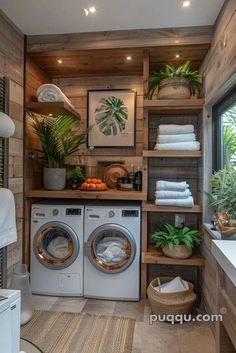 a washer and dryer in a room with wood paneling on the walls