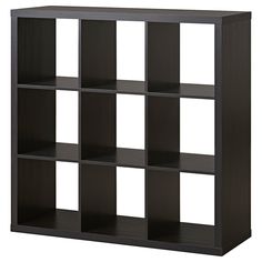 a black bookcase with six cubes on each side