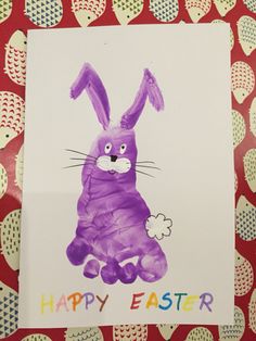 an easter bunny handprinted on a piece of paper