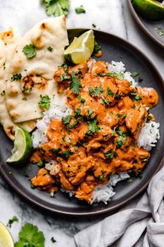 a plate filled with rice, chicken and cilantro sauce next to tortillas