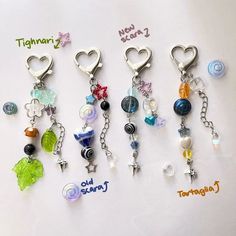 several charms are arranged in the shape of hearts