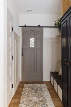 the entryway is clean and ready for us to use as a storage area in this home