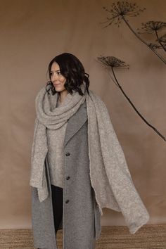 This blanket scarf is made from superfine boucle alpaca yarn. Lightweight, soft and silky, it drapes beautifully, keeps you warm and gives a nice touch to your look thanks to textured structure. Available in 5 colors: beige, light gray, dark gray, charcoal black and brown. The color on the photos is beige and light gray on the last photo. The scarf comes washed, ironed and ready to wear. For more pictures follow us on Instagram on @twillaknitwear COMPOSITION: 89% superfine alpaca/10%nylon SIZE: Oversize Scarf, Alpaca Clothing, Alpaca Shawl, Scarf Blanket, Beige Scarf, Big Scarf, Fall Winter Trends, Scarf Wool, Alpaca Scarf