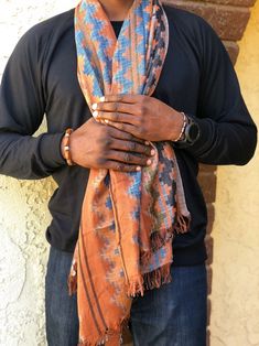 This will be your favorite scarf. It has the right colors for any season and the right weight for warmth. It’s perfect for work or play. Made of polyester and acrylic. Brown Casual Shawl Scarves, Casual Brown Shawl Scarf, Casual Orange Scarves For Fall, Casual Orange Scarf For Fall, Casual Brown Scarf For Fall, Casual Multicolor Scarves, Casual One Size Shawl Scarves, Casual One-size Shawl Scarf, Casual Multicolor Scarf, One Size