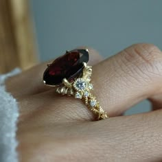 Oval Garnet Queen Victoria Diamond Ring in 14K and 18K Gold – Tippy Taste Jewelry Garnet Ruby Ring, Garnet Gold Engagement Ring, Blood Diamond Engagement Ring, Ruby Red Wedding Ring, Wedding Ring Garnet, Ruby And Diamond Ring Vintage, Red Diamond Wedding Ring, Goth Engagement Rings Gold, Ruby Engagement Ring Vintage Gold