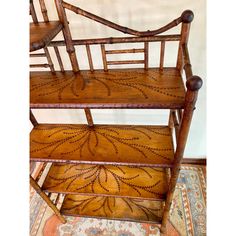 Fabulous 19th Century "burnt" or "tortoise shell" bamboo etagere. Features five shelves, with botanical design motifs complemented by ball finials on the uprights. Charming, and unique - these pieces are increasingly hard to find especially in this larger size.  Note: Shelf clearance - top first - 6"H above                                      second shelf - 10.75" above                                      third shelf - 11.25" above                                      bottom shelf - 12.25" Bamboo Etagere, Bookcase Shelf, Design Motifs, Etagere Bookcase, Botanical Design, Bookcase Shelves, Bottom Shelf, Tortoise Shell, Finials