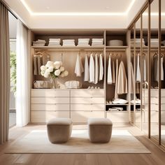 a large walk in closet with white furniture