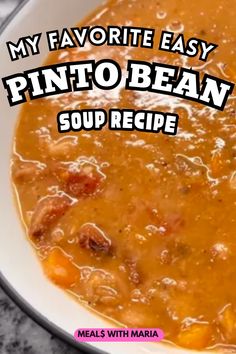 a white bowl filled with soup on top of a table