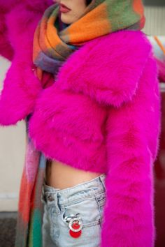 Be bold and stand out with the Cadence Pink Faux Fur Jacket. This stunning jacket features a bright fuchsia faux fur fabrication and a cropped silhouette that is the perfect statement piece to add to your closet! Style this dreamy coat with a minimalist outfit to make it stand out, or add it to a colorful outfit to tie your whole look together. Pink Faux Fur Jacket, Colorful Outfit, Fur Clothing, Pink Faux Fur, Sleeveless Jacket, Fuchsia Color, Colourful Outfits, Faux Fur Jacket, Be Bold