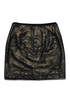 Add some shimmer and shine to your evening ensemble or holiday look with this stylish skirt from Elie Tahari. An intricate lace overlay lends a romantic touch to this sparkling metallic gold skirt, while its mini length keeps it flirty and fun. Pairs perfectly with a black blouse or sweater and gold heels for a dazzling look. Size 4 Lace 100% Nylon Under layer 49% Cotton, 42% Acetate, 9% Polyester Lining 100% 95% Polyester, 5% Elastane Hidden back zip Mini length Waist 27.25" Length 16.75" Chic Lace Party Skirt, Elegant Metallic Skirt With Sequins, Elegant Lace Mini Skirt With Lining, Gold Mini Skirt For Evening, Elegant Metallic Mini Skirt For Evening, Lace Party Skirt With Lining, Lace Lined Skirt For Party, Chic Metallic Mini Skirt For Evening, Gold Skirt For Holiday Night Out