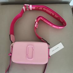 Size: Approximately Approx. 7"(18cm) X 2"(6cm) X 4"(11cm) Shoulder Strap Length: Approximately 97-143 Materials:Cowhide Standardization:Zipper Opening / Inner Side: Separation Layer X 2, Opening Bag X 1 / Outer Side: Opening Bag X 2 Condition:Band New And Never Used,Comes With Dust Bag Snapshot Marc Jacob’s, Mark Jacob’s Bag, Pink Marc Jacobs Bag, Pink Girly Things Accessories, Snapshot Bag, Cute Christmas Ideas, Bags Marc Jacobs, Marc Jacobs Crossbody Bag