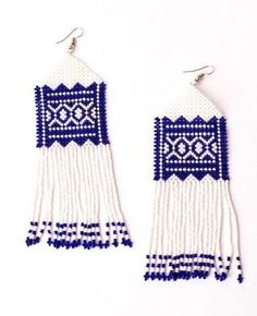 two pairs of white and blue beaded earrings with tassels on the ends