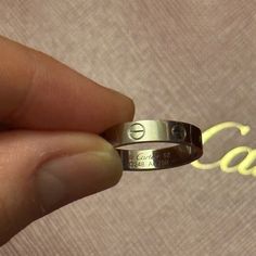 Authentic Cartier Wedding Band Love Ring In White Gold Size 52. Purchased Online Aug 25, 2022. Certificate, Box, And Bag Will Be Included. Receipt Will Not Be Included As It Has My Personal Information Along With Other Items I Had Purchased. There Are Normal Wear And Tear As Pictured However, It Could Be Easily Cleaned And Buffed Out At The Cartier Store For Free. I Have Not Gotten It Serviced Yet. I Am Selling Because I Don’t Use This As Much Since The Sizing Ended Up Being Too Small And I Felt Like The White Gold Doesn’t Suit Me. So, I’m Trying To Sell My White Gold Jewelry. I Cannot Lower My Price By Much As At Its Current Price I’m Already At A Significant Loss. Cartier Platinum Wedding Jewelry, Classic Cartier Jewelry For Wedding, Cartier Jewelry Brilliant Cut For Wedding, Cartier Brilliant Cut Wedding Jewelry, Cartier Wedding Ring With Round Band, Luxury Cartier Wedding Jewelry, Cartier Wedding Jewelry With Round Band, Cartier Wedding Rings With Vs Clarity, Cartier Silver Diamond Cut Jewelry