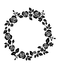 a black and white floral wreath with roses on it's sides, in the shape of a circle