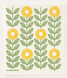 an orange and green flower pattern on a white paper with yellow flowers in the middle