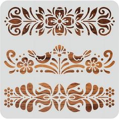 some wooden designs on a white background