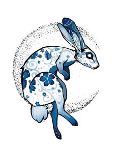 a blue and white rabbit with flowers on it's body