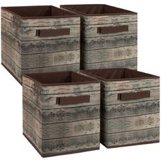 three wooden boxes with brown leather handles