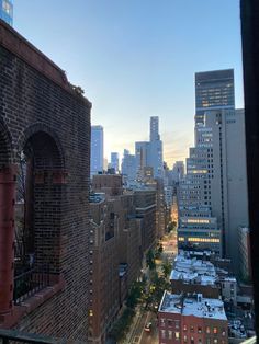 the city skyline is seen from an apartment window in new york's financial district