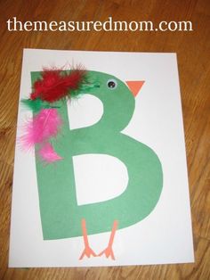 the letter b is for bird with feathers on it