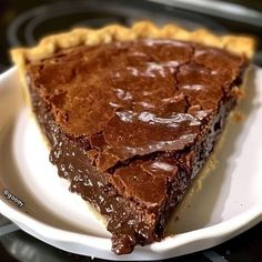 a piece of chocolate pie on a white plate