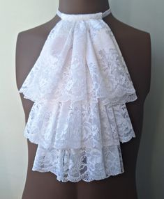 White lace jabot. Ideal accessory for a Steampunk wedding. Pirate party, vampire costume lace jabot. This jabot is made from high-quality lace and fits great with a blouse.  Fits all neck sizes.    Please check the size below. Jabot size: Length - 34cm (13.3") Width - 23cm (9.05") Hand washes. Lay on a flat surface to dry. In my photos, I always try to show the colors of my product as accurately as possible. The colors may vary depending on your screen. Shipping: worldwide from Europe (Latvia) w White Gothic Costume Accessories For Cosplay, Jabot Pattern, White Victorian Overbust Corset, White Victorian Blouses With Cleavage, Vampire Cosplay, White Victorian Blouse With Lace Trim, Blouse Fits, Pirate Cosplay, Vampire Costume