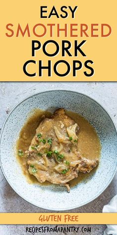 a bowl filled with meat and gravy on top of a table