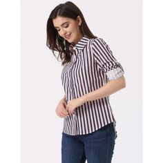 Clean stripes lend a graphic touch to this button-down shirt. A trendy high-low hem and roll-up sleeves for added laid-back appeal. Wear this on the weekend running errands or Sunday brunch. Pair it perfectly with your favorite trousers and heels for an instant charming outfit. Amp up your ensemble with this striped shirt. Casual Blouse With Roll-up Sleeves And Shirttail Hem, Trendy Button-up Shirt With Rolled Sleeves, Trendy Cotton Shirt With Roll-up Sleeves, Casual Tops With Roll-up Sleeves And Shirttail Hem, Trendy Relaxed Fit Shirt With Shirttail Hem, Trendy Shirt With Relaxed Fit And Shirttail Hem, Casual Shirt With Shirttail Hem For Work, Trendy Cotton Shirt With Button Cuffs, Trendy Shirt With Cuffed Sleeves For Workwear