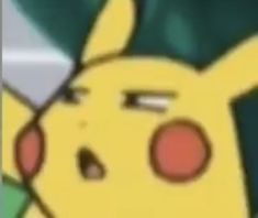 a close up of a pikachu with its mouth open