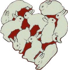 a group of animals standing in the shape of a heart