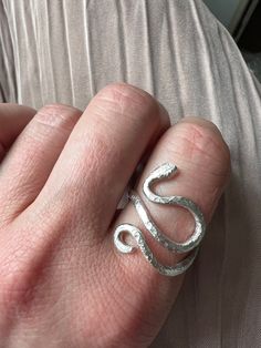 Snake ring  silver wrap adjustable ring.  Snakes symbolise ancestral wisdom  Hand made out of 100% recycled silver. the ring is  adjustable but I make them to order to make sure the form is harmonious. weight approximately 6. 5 grams Ancestral Wisdom, Silver Wrap Ring, Snake Ring Silver, Wrap Ring, Snake Ring, Recycled Silver, Hammered Silver, Wrap Rings, Adjustable Ring