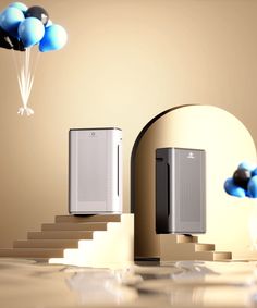 an air purifier sitting on top of a table next to some balloons