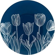 a blue plate with white tulips in the center on a dark blue background